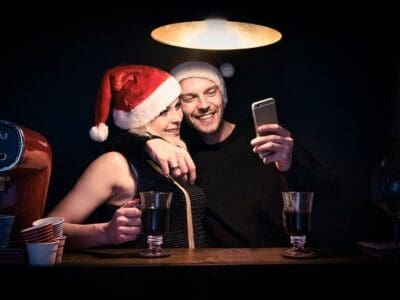 two people taking a selfie and smiling