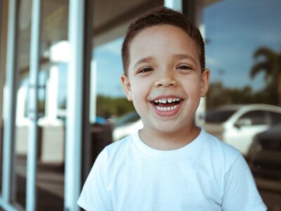 child smiling for dental crown